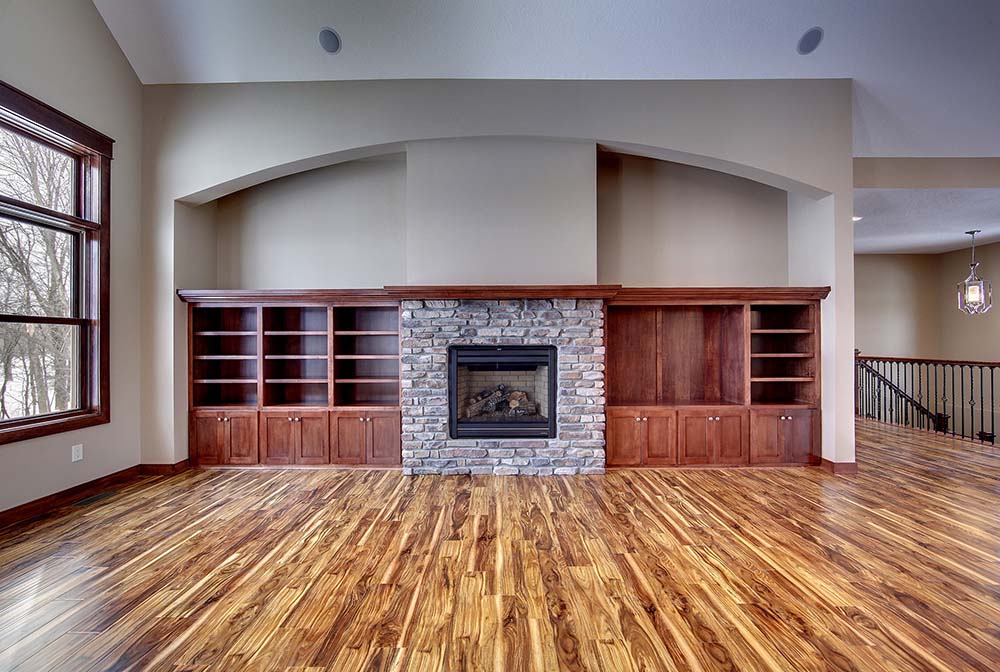 Living room with fireplace and builtin cabinetry