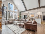 Decorated great room with vaulted ceiling