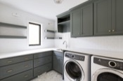 Laundry room with custom cabinetry